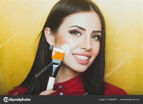 Sexy Pretty Brunette Woman Face With Artist Or Makeup Brush Stock Photo By Tverdohlib