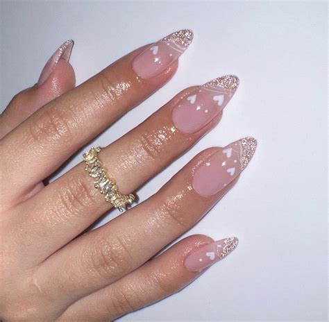 Short Stiletto Nails Nude Glitter Base With A Glitter French Outline
