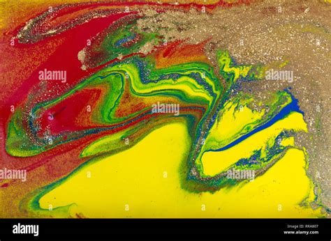 yellow  gold marbling pattern golden marble liquid texture stock