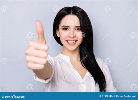 Cheerful Brunette Pretty Girl With Beaming Smile Is Gesturing A Stock Photo Image Of Feminine