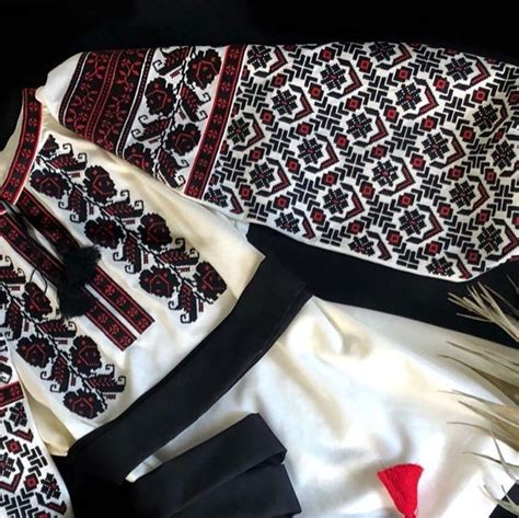 some black and white items are laying out on the ground together ...