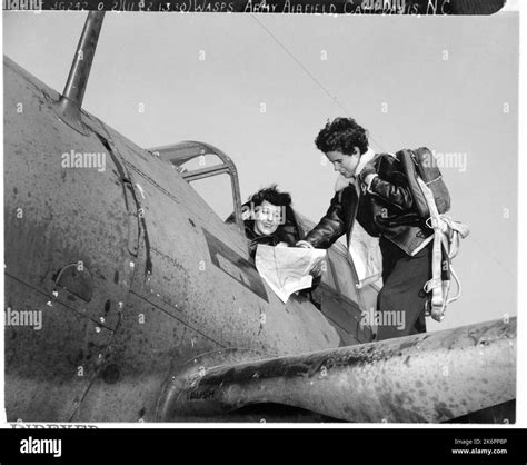 WASPs Around a Curtiss A-25A Making Last Minute Check-Up Before Taking ...