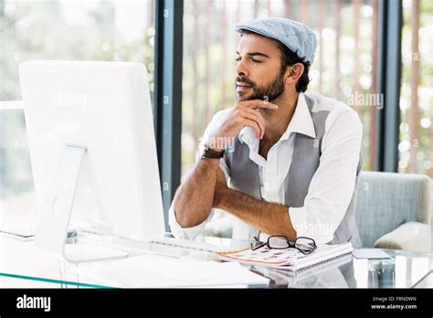Focused Man Working On Computer Stock Photo Alamy