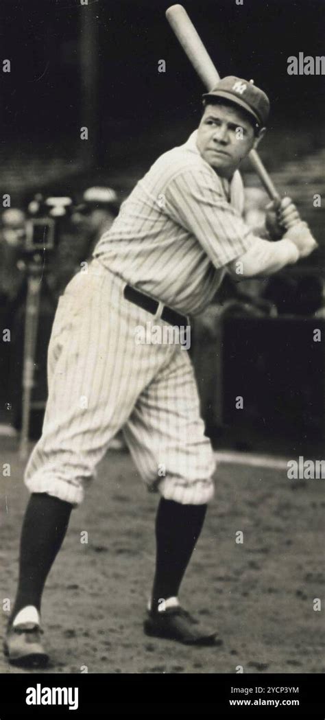 Vintage Portrait Of Baseball Player Babe Ruth With Bat In Hand Wearing