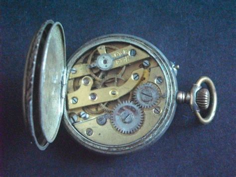 Швейцарские часы в серебряном корпусе : купля-продажа Антиквариата