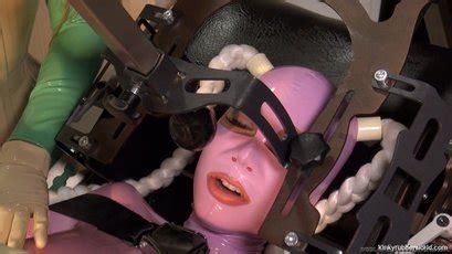 Horny Latex Lara Getting Pleased With Toys By Two Friends Photos