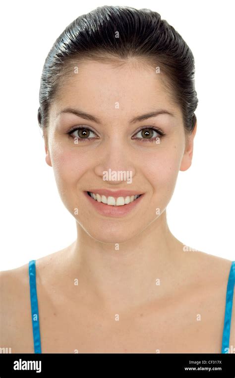 Female With Brunette Hair Off Face Looking To Camera Smiling Showing Teeth Stock Photo Alamy