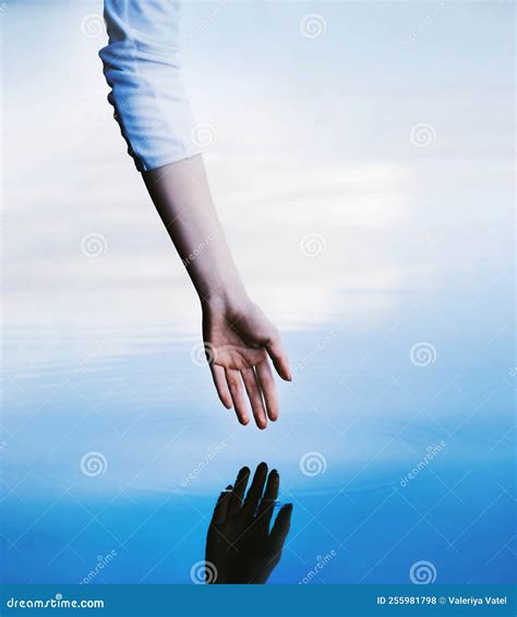 The Hand of a Woman Stretches in the Clear Water of the Lake, Leaving
