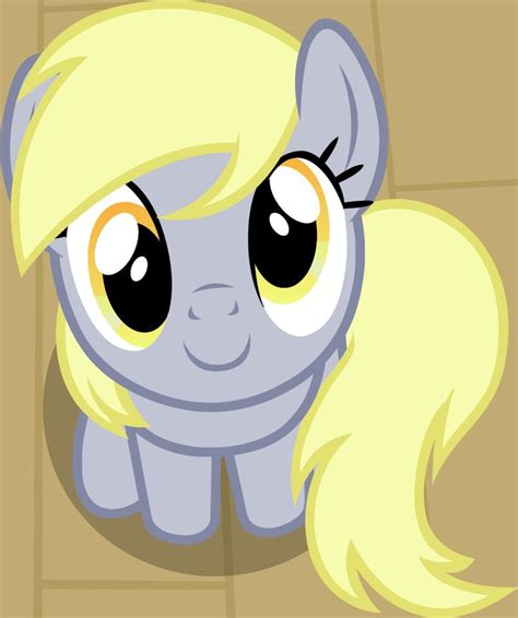 A Cartoon Pony With Blonde Hair And Big Eyes Sitting On A Tile Floor