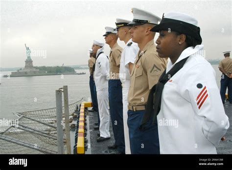 Us Navy Sailors And Marines Man The Rails Aboard The Amphibious Assault