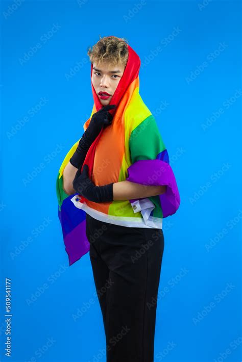Asian Gay With Pride Flag Rainbow Isolated Blue Color Background Lgbtq And Lgbtq Concept Stock