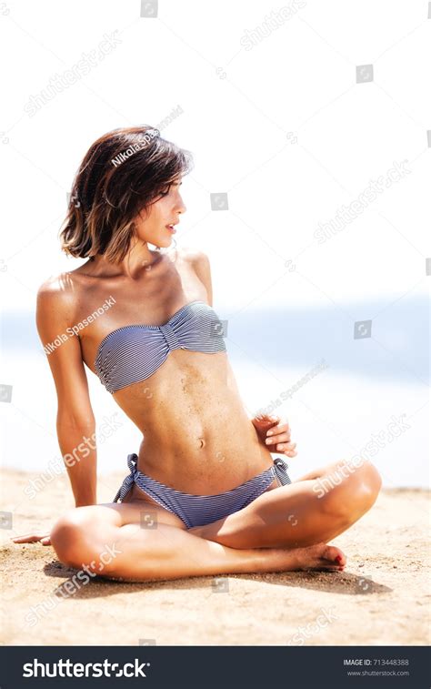 Sexy Girl Bikini Sunbathing On Beach Stock Photo 713448388 Shutterstock