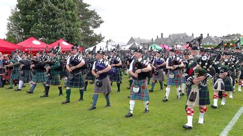 Massed Pipe Bands Salute Chieftain On The March During Opening Parade