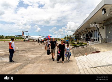 Apr 26, 2019 Passengers walking to airport arrival terminal at Siargao ...