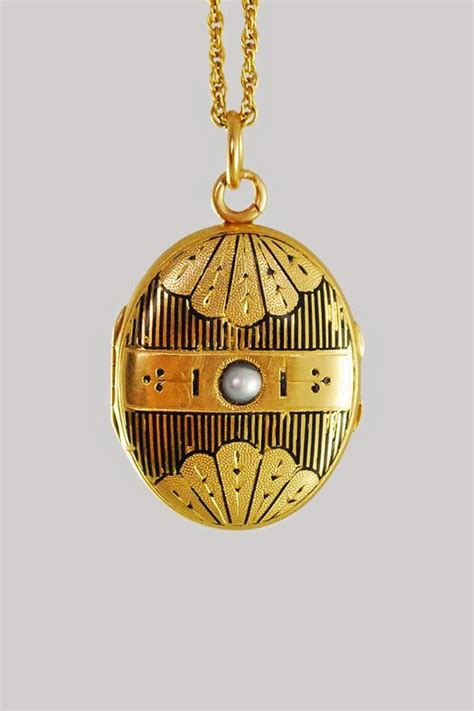 In The Swan S Shadow 14k Black Enamel And Pearl Locket Ca 1860