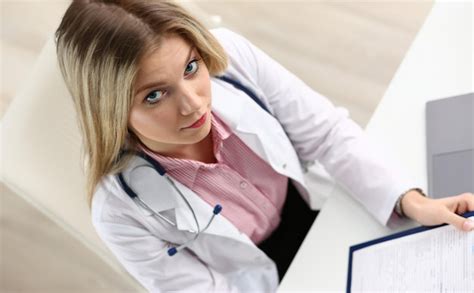 Premium Photo Beautiful Smiling Female Doctor Hold Clipboard