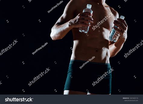 Man Tight Shorts Naked Torso Holds Stock Photo Shutterstock