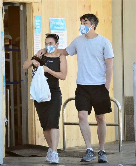 Charli XCX in a Black Dress Was Seen Out with Her Boyfriend Huck Kwong