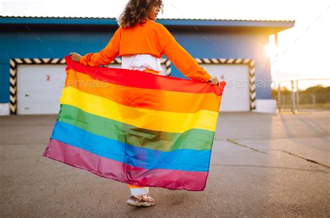 African Lesbian Woman Holding Lgbt Rainbow Flag Concept Of Happiness