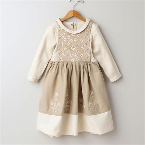 Premium AI Image | a dress hanging on a hanger with a white dress ...