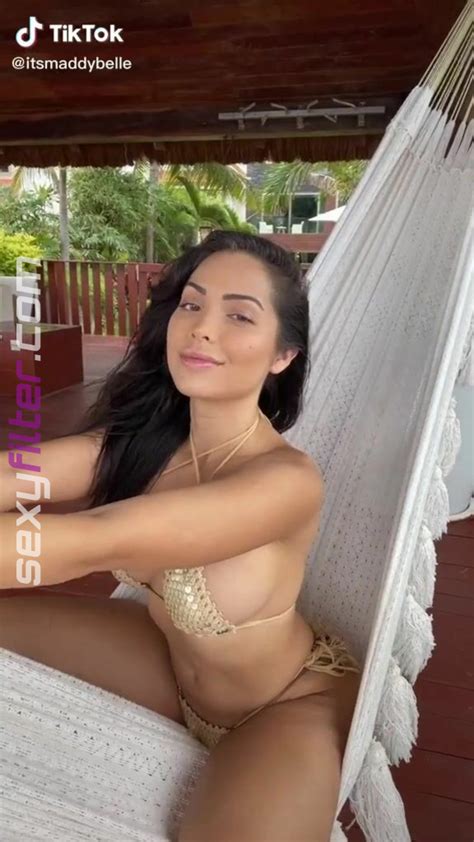 Sweet Maddy Belle Shows Cleavage In Cute Golden Bikini Sexyfilter