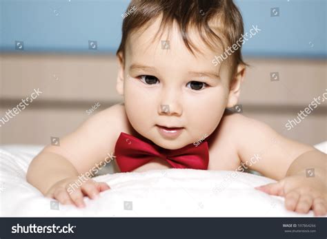Naked Baby Boy Smiling Wearing Bow Stock Photo 597864266 Shutterstock