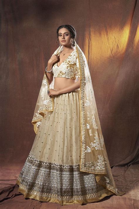 Beige Glittered Heavy Border Designer Lehenga Choli Rent Elegant