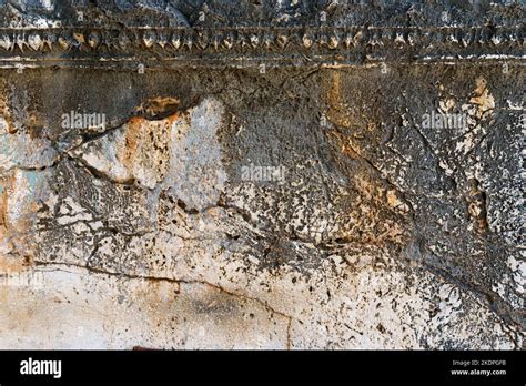 Ancient Greek antique text and inscriptions on the stone wall of the ...