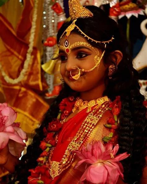 East Indias Kumari Puja Ritual Of Worshipping Living Goddesses Young Girls Glow In Bridal Attire