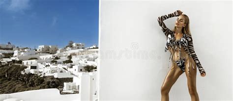 Elegant Blonde Model In Bikini Is Sensually Posing In Luxury Resort With View Of The Island Of