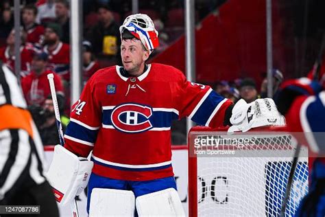 Montreal Canadiens goalie Jake Allen looks towards his bench with his ...