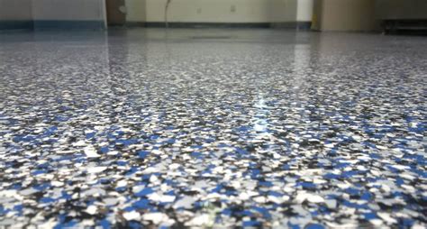 Garage Floor Tiles VS Epoxy (Pros And Cons) - Eagles Garage