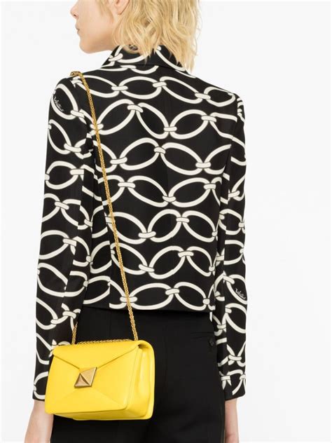 valentino garavani  stud leather crossbody bag yellow farfetch