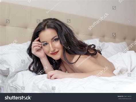 Sexy Brunette Smiling Camera While Lying Stock Photo 298114610 Shutterstock