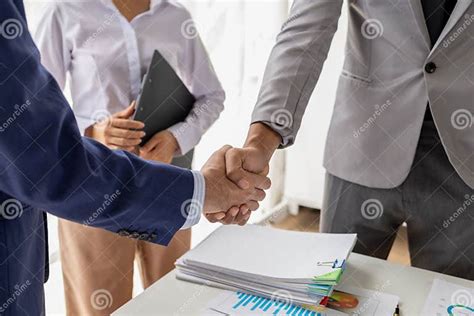 Two Business Men Shake Hands Two Businessmen Are Agreeing On Business