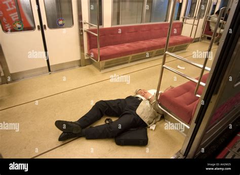 Drunk Man Passed Out On Last Train Home Tokyo City Honshu Island Japan