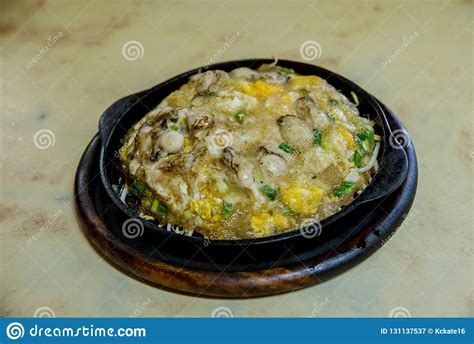 Oyster Omelette In Hot Pan Oyster Omelette Served On Hot Pan Chinese