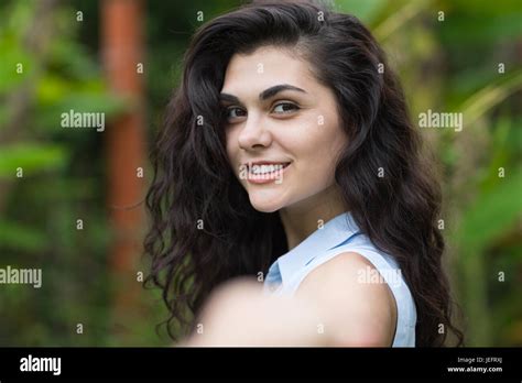 POV Of Beautiful Brunette Woman Holding Male Hand Over Tropical Forest Landscape Stock Photo Alamy