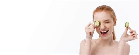Free Photo Close Up Beauty Portrait Of A Smiling Beautiful Half Naked Woman Holding Cucumber