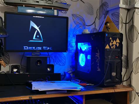 My rig I spruced up,screensaver I made myself from intro on Deus ex