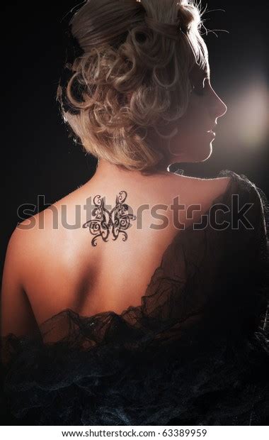Portrait Sexy Blonde Tattoo On Her Stock Photo 63389959 Shutterstock