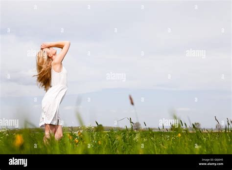 Beautiful Blonde Woman Outdoor In Summer Happy Stock Photo Alamy