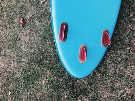 Premium Photo Surfboard On The Beach