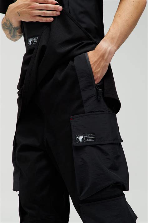 Молодежные штаны оверсайз с высокими манжетами и накладными карманами ...