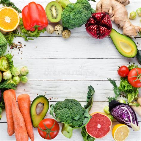 Fresh Vegetables And Fruits On A White Wooden Background Healthy