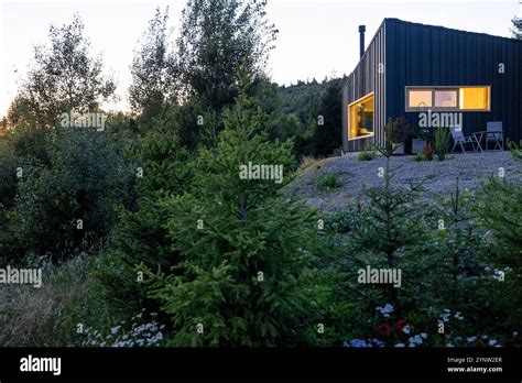 Cozy Cabin At Dusk Stock Photo Alamy