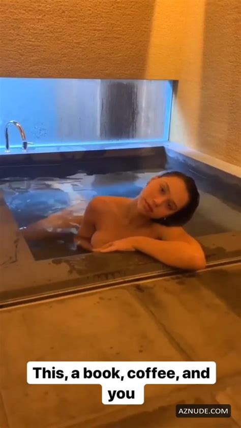 Alexis Ren Nude Covered Photos While Taking A Bath At A Hotel During