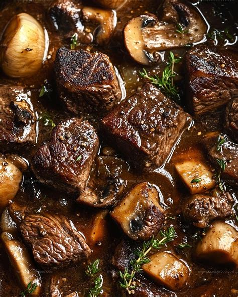 hearty braised beef stew  mushrooms  cognac recipe culinary duo