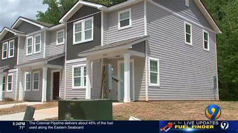 Charlotte families receive townhomes from Habitat For Humanity for the