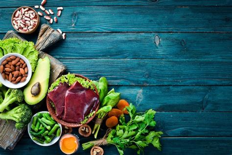 Premium Photo | Food containing natural iron fe liver avocado broccoli